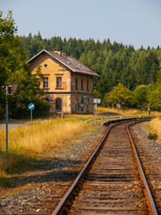 Fototapeta na wymiar Small old railway station in rural area