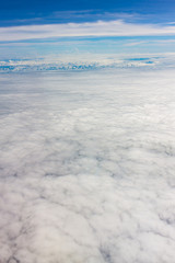 Fototapeta na wymiar White fluffy clouds in the blue sky