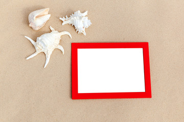 photo frames on sand