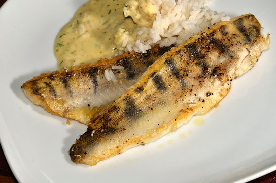 Zander-Filet auf Reis