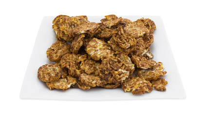 Chocolate flavored rice crisps on dish