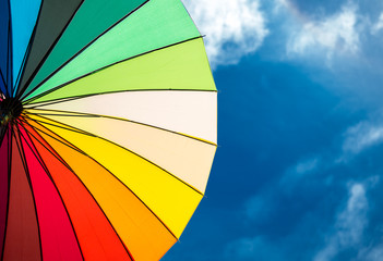 Obraz premium colorful umbrella segments on blue sky