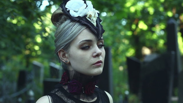 Girl turns her head from her scary white eyes. She a mystical and terrible.