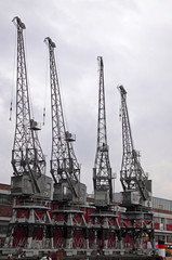 Old dock cranes in Bristol harbour UK