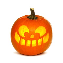 Illuminated Halloween Jack o Lantern isolated on a white background