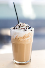 Summer cocktails with ice cream on wooden table