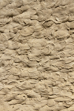 Textura o fondo de pared revocada con arena y cemento