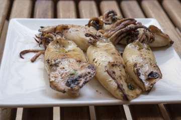 Squid with garlic and peregil