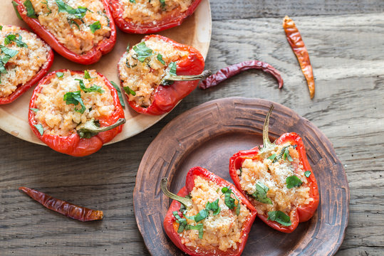 Stuffed red bell peppers with white rice and cheese - Powered by Adobe