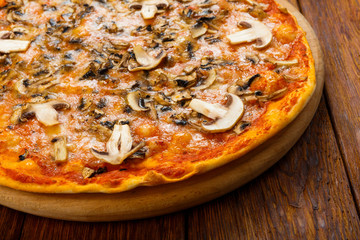 Delicious pizza with mushrooms and smoked chicken