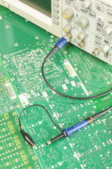 Electronics ocilloscope probe on the printed circuit boards