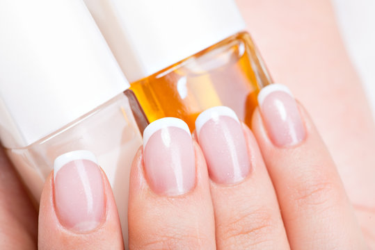 Beautiful woman's nails with french manicure