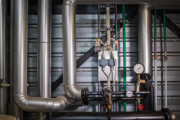 the pipes in the boiler room
