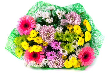Bouquet of chrysanthemums and gerbera flowers in green package i