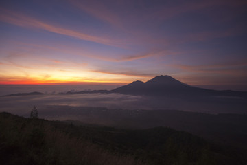 Fantastic view from the Mount Batur at sunrise in the morning