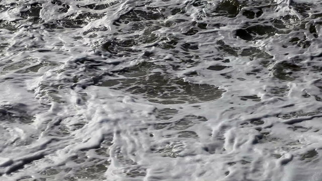 Waves rolling on the beach on a stormy day, batum, georgia