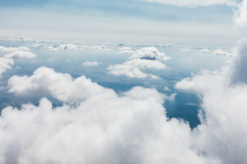 aerial view of  the  landscape over the clouds