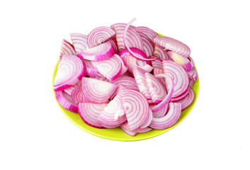 Slised red onion on plate, isolated on white background