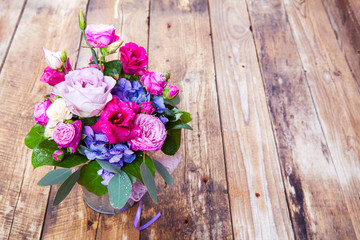 flowers. bouquet of roses on a wooden background