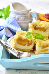 Pieces of peach pie with curd.