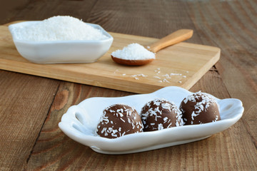 Chocolate candy with coconut topping