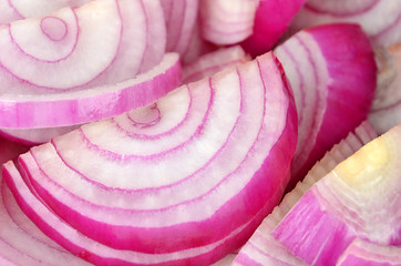 Slised red onion, close up, as background  DOF