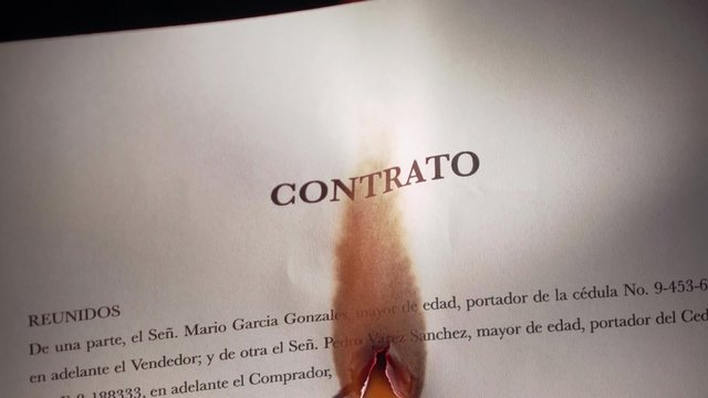 6 Contract In Spanish Burning On Fire In Slowmotion