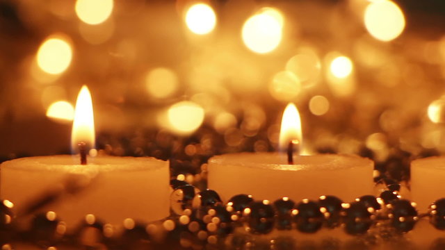 Candles and christmas lights panning