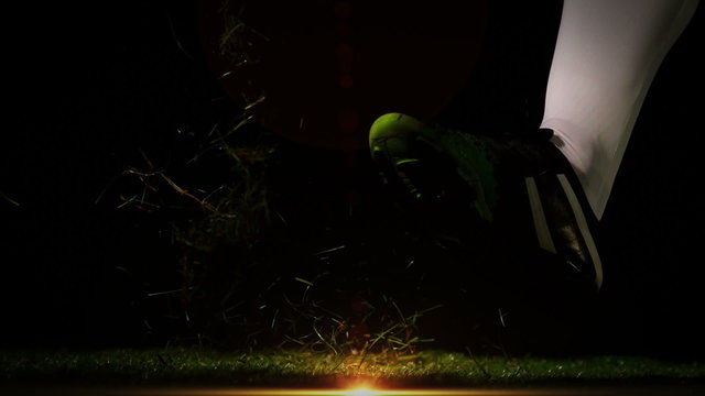 Player kicking wales rugby ball  