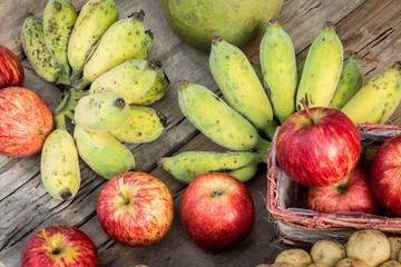 Assorted fresh fruit natural background wood floors.