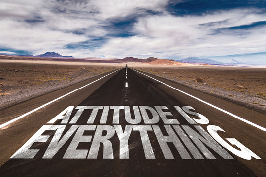 Attitude is Everything written on desert road