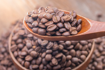 coffee beans in spoon wooden