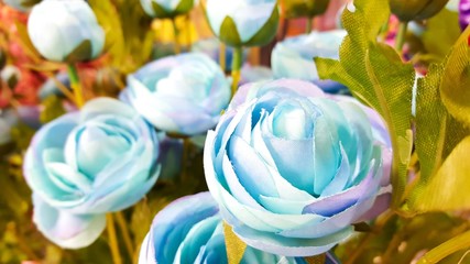 Fototapeta na wymiar Beautiful Pastel Blue Artificial Roses 