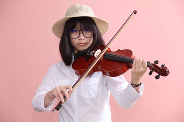 Asian teen with violin glasses hat smile