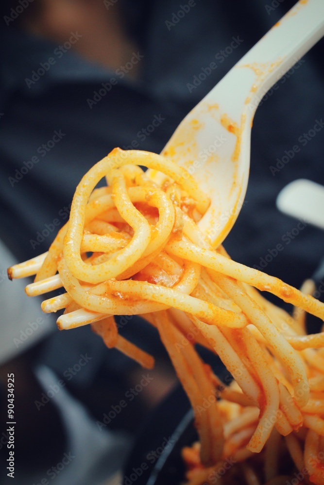 Canvas Prints woman eating spaghetti with sauce