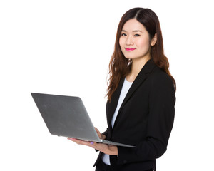 Asian businesswoman use of the notebook computer