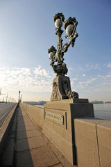 Fototapeta premium the lights on the Troitsky bridge over the Neva river in St. Pet