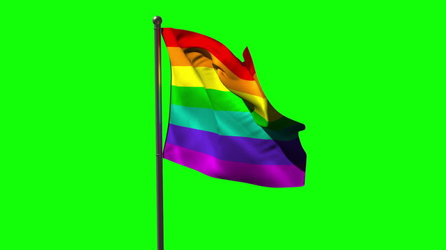 Rainbow flag blowing against green screen