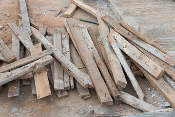 Pile of old used timber at construction industry site
