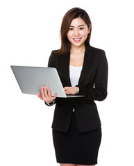 Asian businesswoman use of the laptop computer