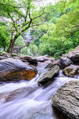 Fototapeta premium Khlong Lan waterfall in national park, Kamphaeng Phet Thailand.