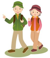 ハイキングする高齢者　秋