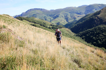Fototapeta na wymiar trekker on a journey in Basque country mountains
