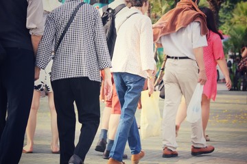 Blurred of people walking in city