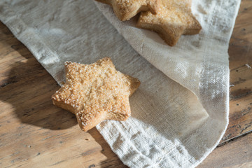 closeup, delicious shortbread placed on a napkin on a wooden tab