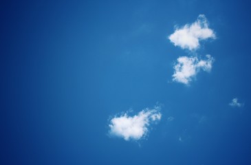 Clouds on the blue sky.