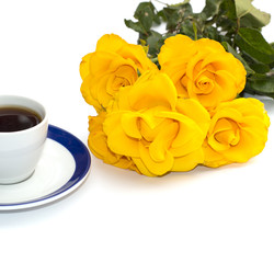cup of coffee and yellow flowers, isolate