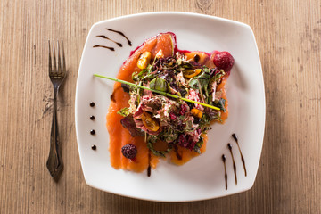 Salmon carpaccio top view.