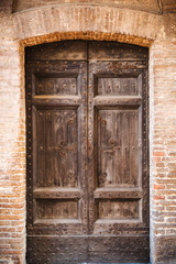 Fototapeta na wymiar Background door from iltalian streets in Tuscany