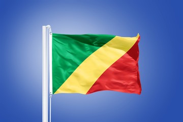 Flag  Republic of the Congo flying against a blue sky